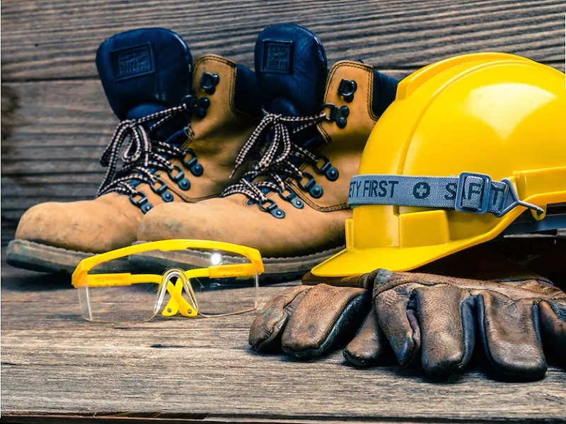 Safety boots, helmet, glasses and work gloves